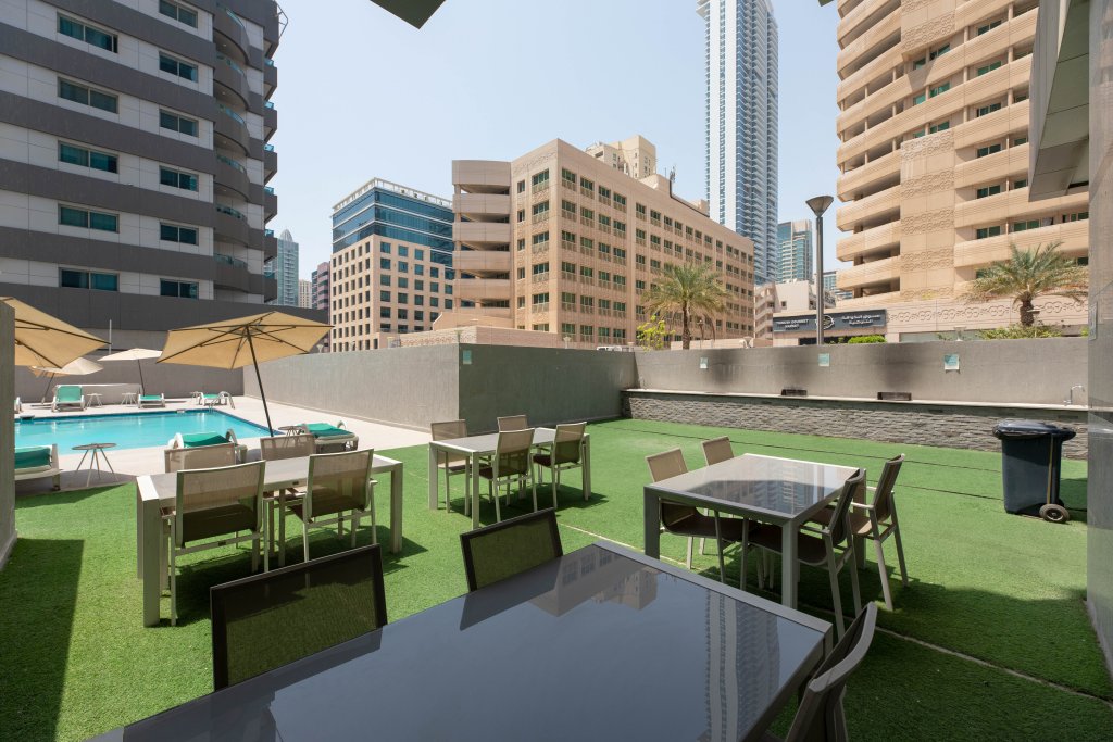 Дубай: Апартаменты Urban Caves - Stylish Condo Near Marina Walk With City Views