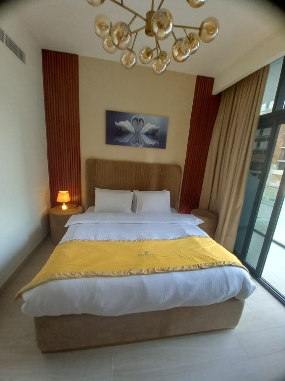 Дубай: Апартаменты Cosmos Living MBR City 9 mins Burj Khalifa