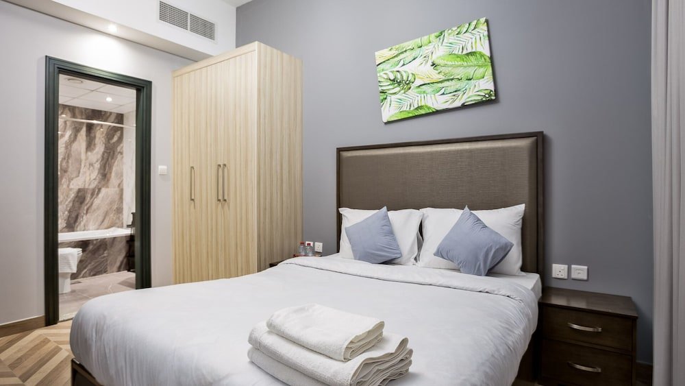 Дубай: Luxury StayCation - Elegant 1BR Apartment in the Heart of Dubai