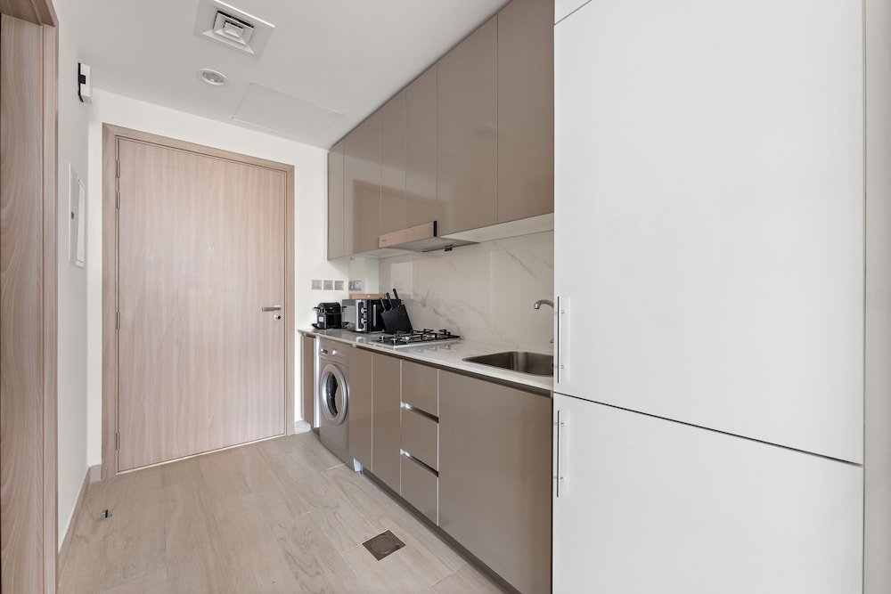 Дубай: WelHome - Your Dubai Getaway: Cozy Studio at Azizi Rivera 4