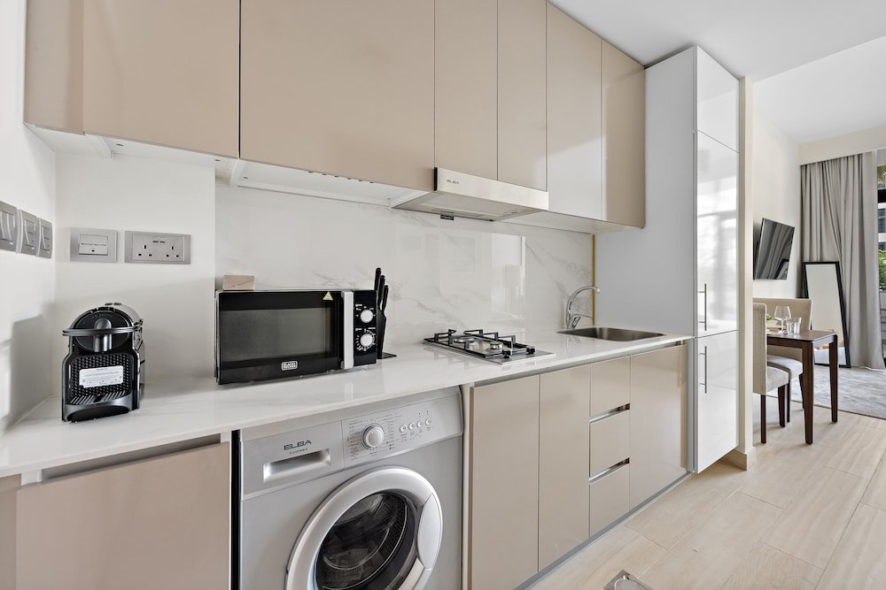 Дубай: WelHome - Your Dubai Getaway: Cozy Studio at Azizi Rivera 4