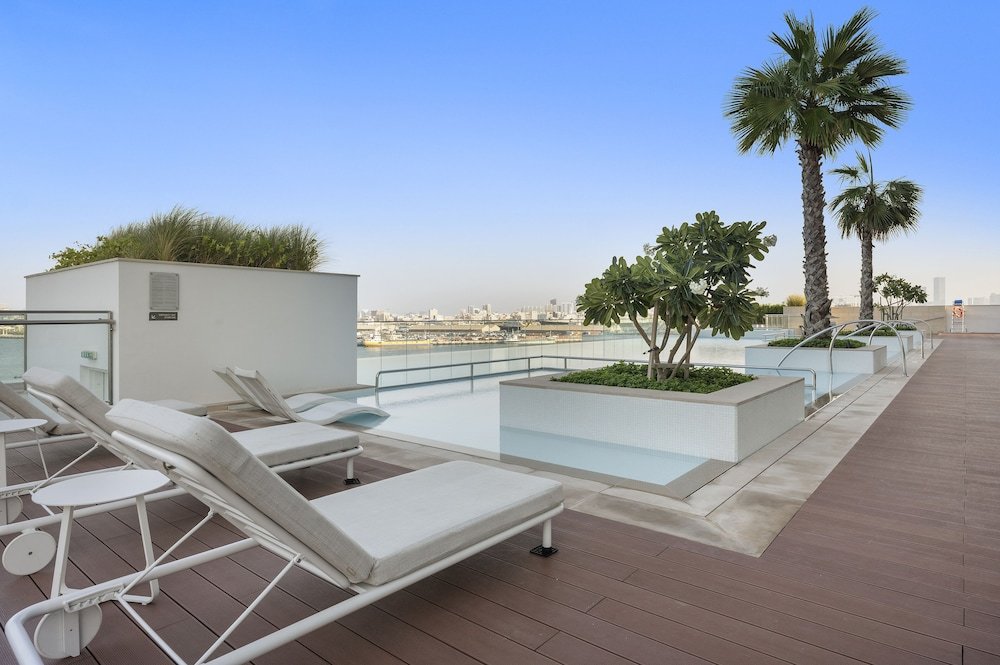 Дубай: WelHome - Seaside Serenity: Spacious 1 BR in Maritime City
