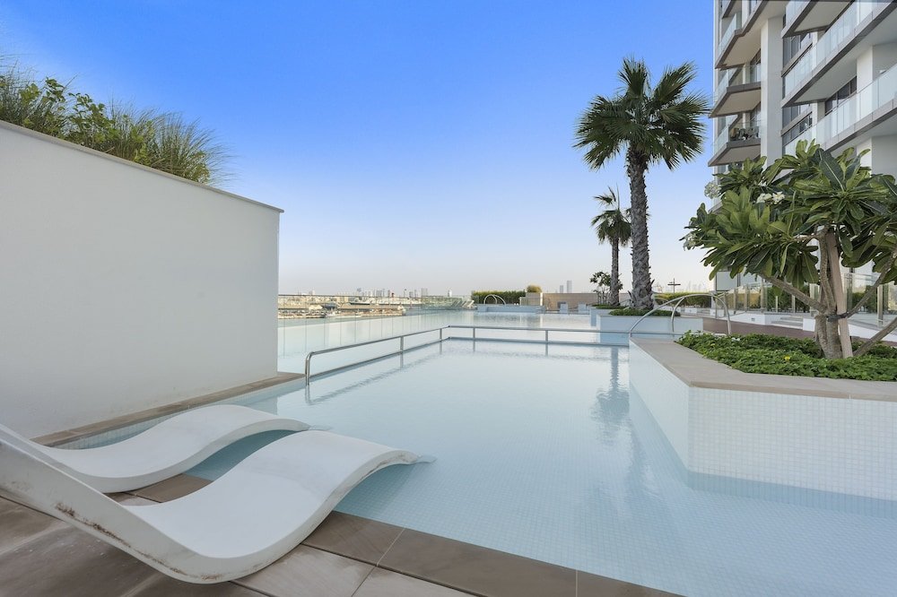 Дубай: WelHome - Seaside Serenity: Spacious 1 BR in Maritime City