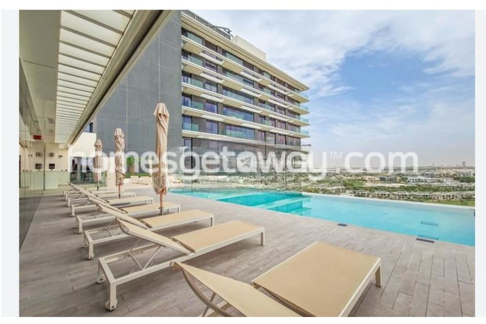 Дубай: HomesGetaway-Golf Suites Dubai Hills 1BR