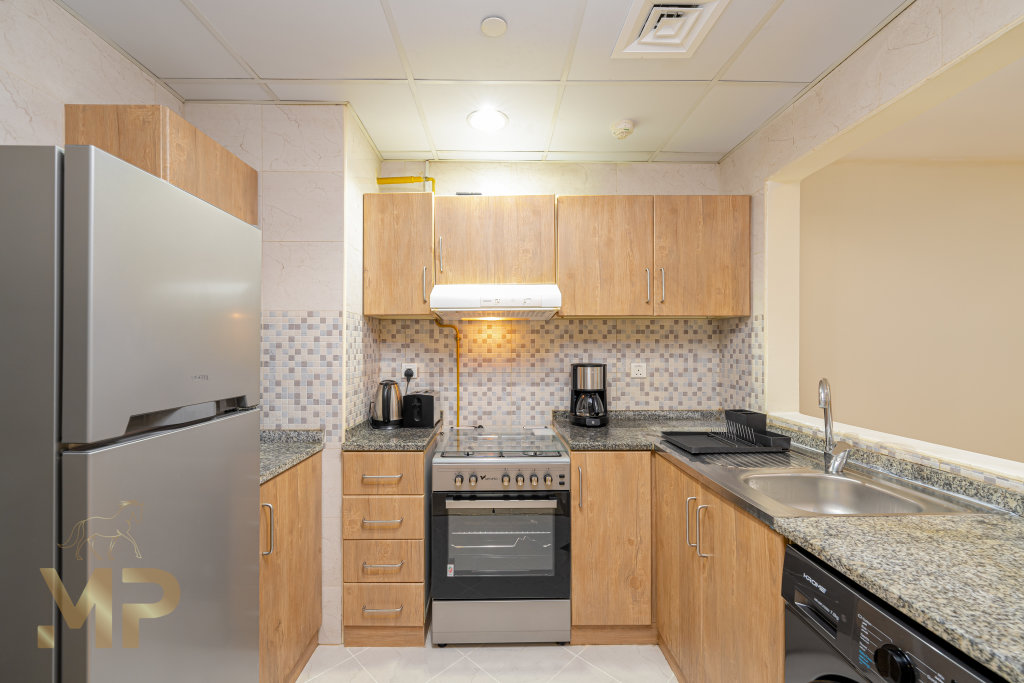 Дубай: Апартаменты Marco Polo - Modern Luxury Apt in JVC: 1BR Gem with City Views