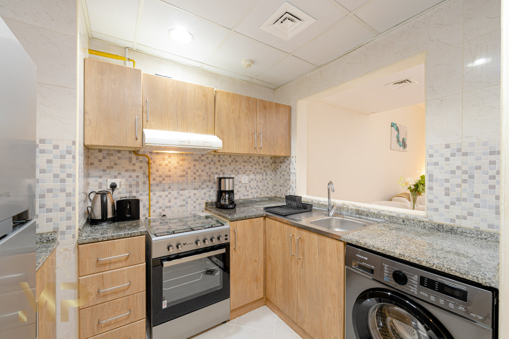 Дубай: Апартаменты Marco Polo - Modern Luxury Apt in JVC: 1BR Gem with City Views