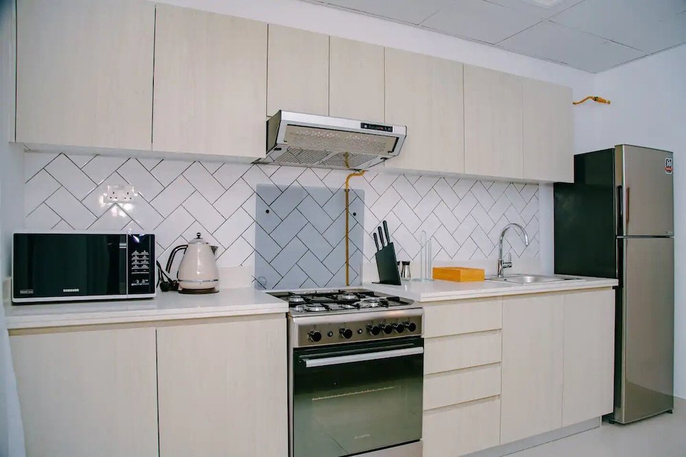 Дубай: Green community 1BR 15 min to sea