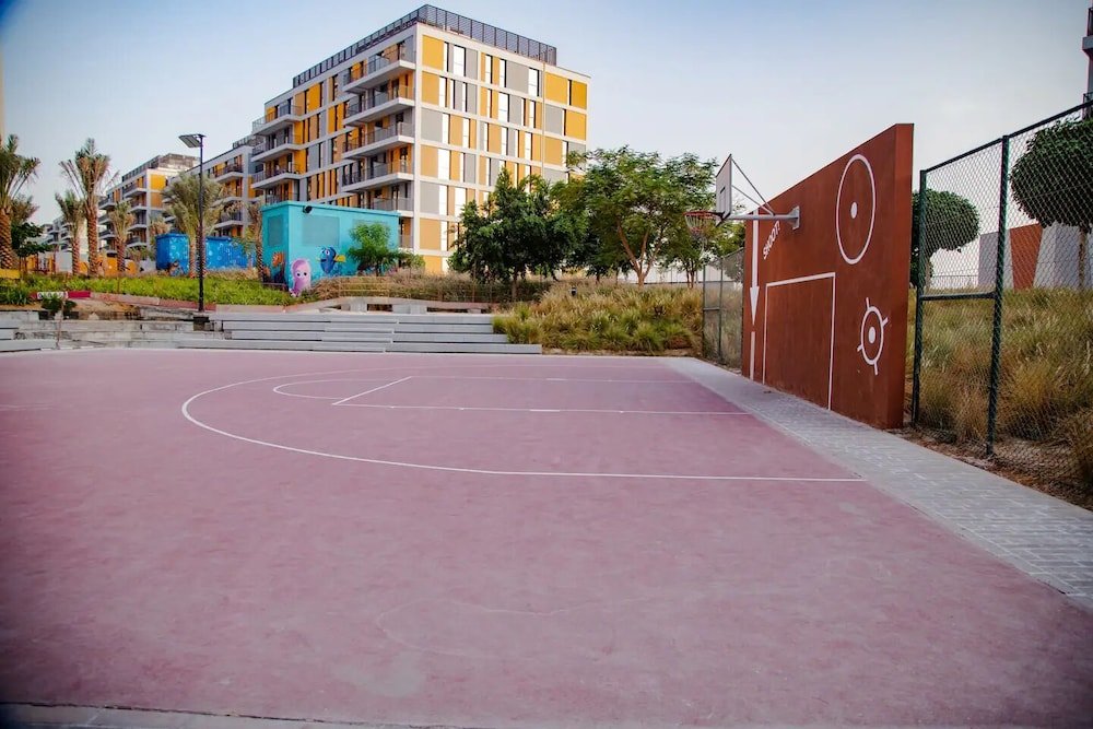 Дубай: Green community 1BR 15 min to sea