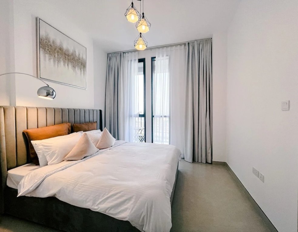 Дубай: Green community 1BR 15 min to sea