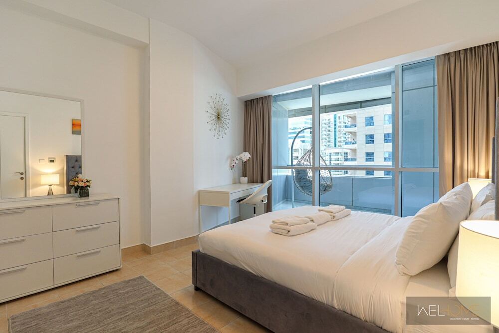 Дубай: WelHome - Mesmerizing 1BR Apartment in Damac Waves A