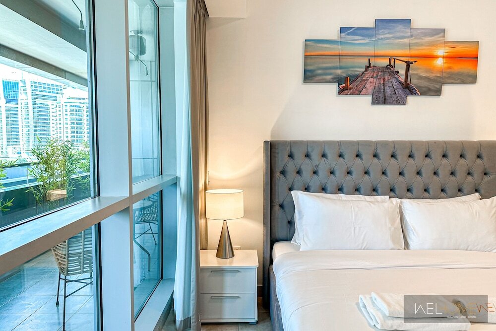 Дубай: WelHome - Mesmerizing 1BR Apartment in Damac Waves A