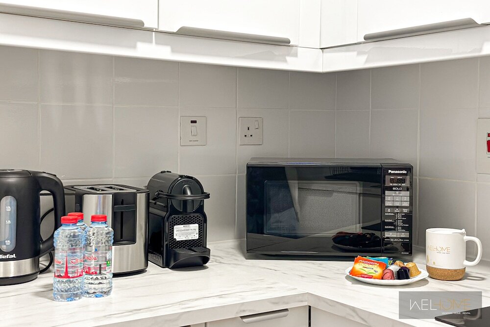 Дубай: WelHome - Mesmerizing 1BR Apartment in Damac Waves A