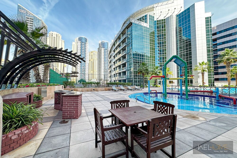 Дубай: WelHome - Mesmerizing 1BR Apartment in Damac Waves A