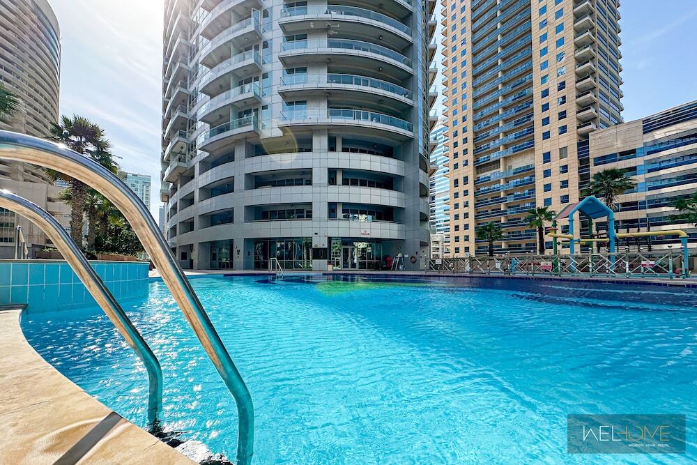 Дубай: WelHome - Mesmerizing 1BR Apartment in Damac Waves A