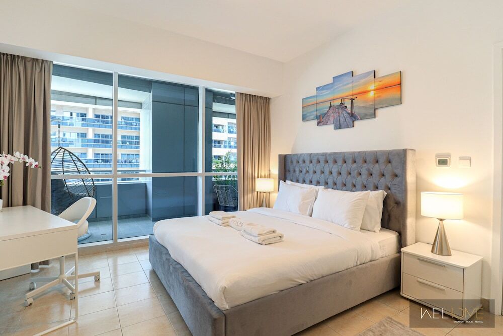 Дубай: WelHome - Mesmerizing 1BR Apartment in Damac Waves A