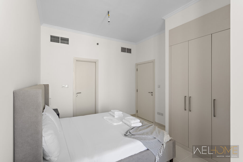 Дубай: Апартаменты WelHome - Breathtaking 1BR Apt with Balcony and City View
