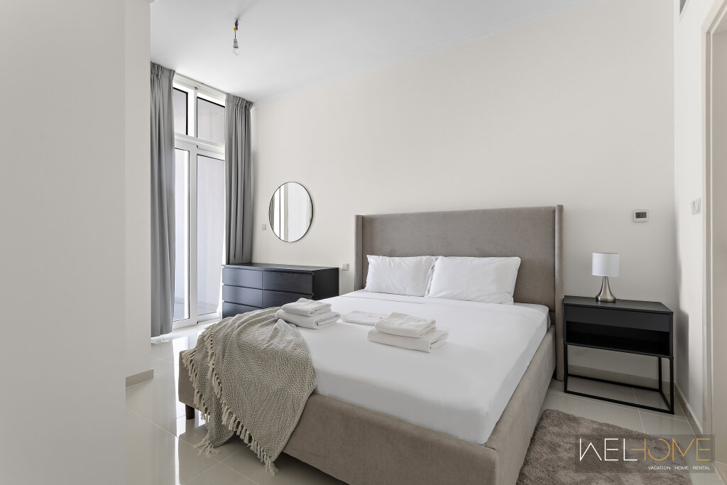 Дубай: Апартаменты WelHome - Breathtaking 1BR Apt with Balcony and City View