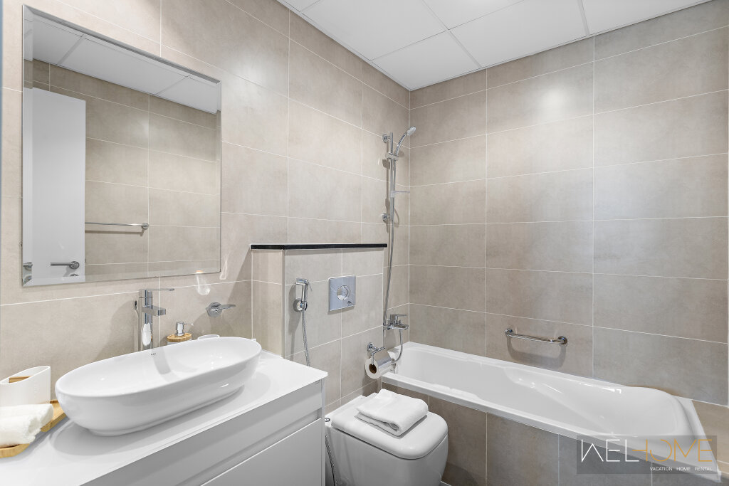Дубай: Апартаменты WelHome - Breathtaking 1BR Apt with Balcony and City View