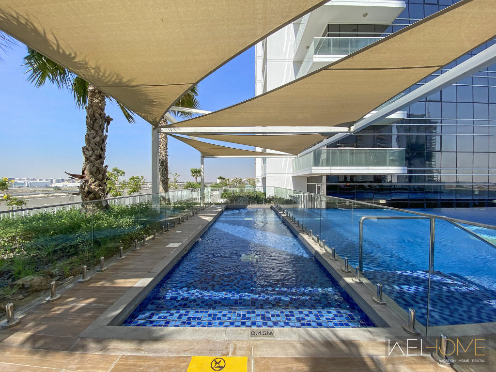 Дубай: Апартаменты WelHome - Breathtaking 1BR Apt with Balcony and City View
