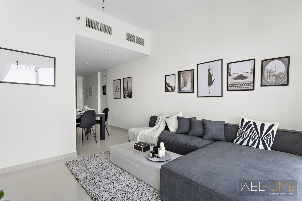 Дубай: Апартаменты WelHome - Breathtaking 1BR Apt with Balcony and City View