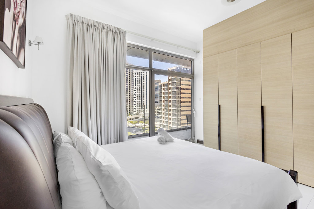 Дубай: Апартаменты WelHome - Urban Retreat with Terrace and City Views