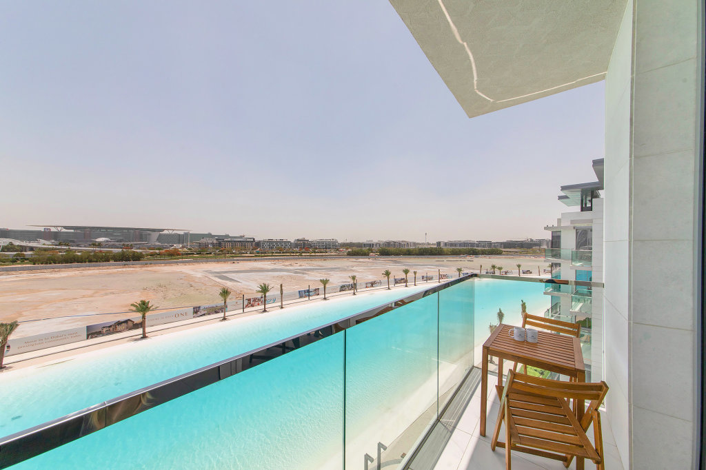 Дубай: Апартаменты Amazing 1BR with Lagoon view at District One