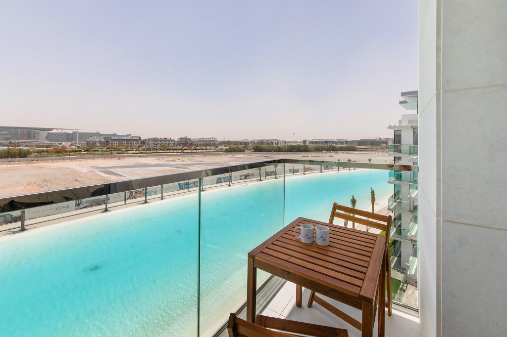 Дубай: Апартаменты Amazing 1BR with Lagoon view at District One