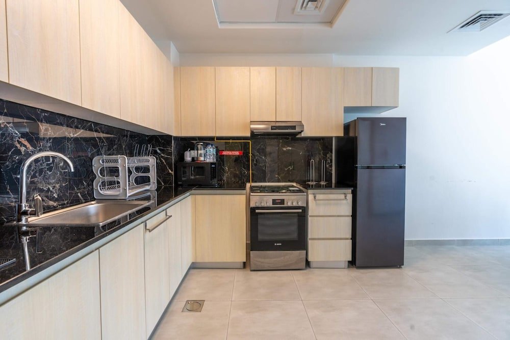 Дубай: Bright & Spacious 1BD Flat With Balconydubai JVC