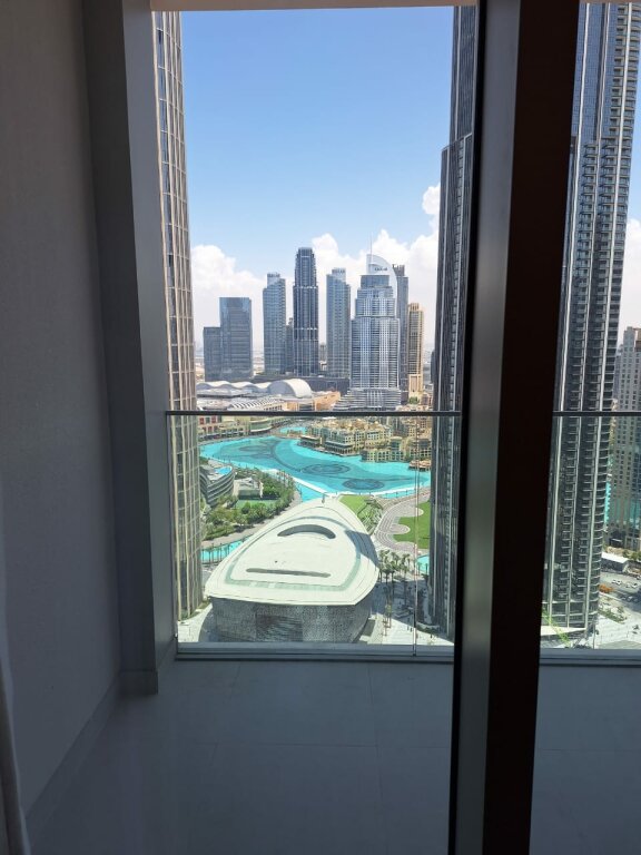 Дубай: Апартаменты Dancing Fountain Views & Steps from Dubai Mall: Your 3-Bedroom Getaway