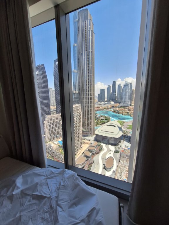 Дубай: Апартаменты Dancing Fountain Views & Steps from Dubai Mall: Your 3-Bedroom Getaway