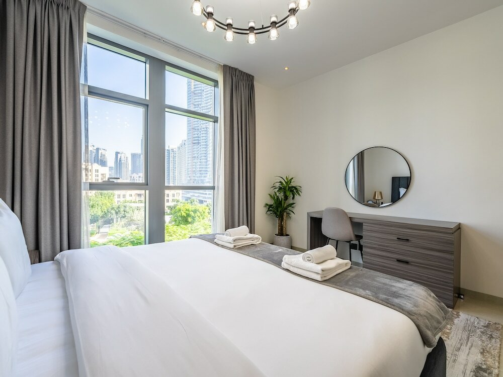 Дубай: Modern DT Escape1BR with Upscale Comfort