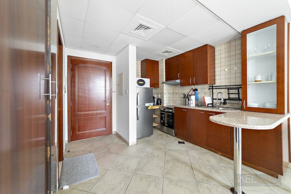 Дубай: WelHome - Stylish Studio with Park Views in Regent House 2