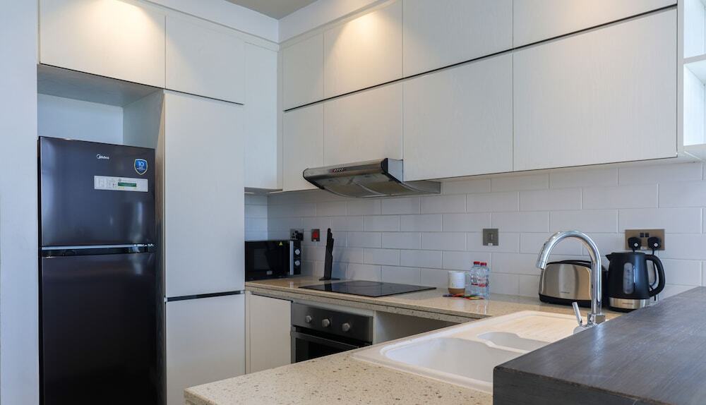 Дубай: WelHome - Prime 1BR Apartment at Oia Residence