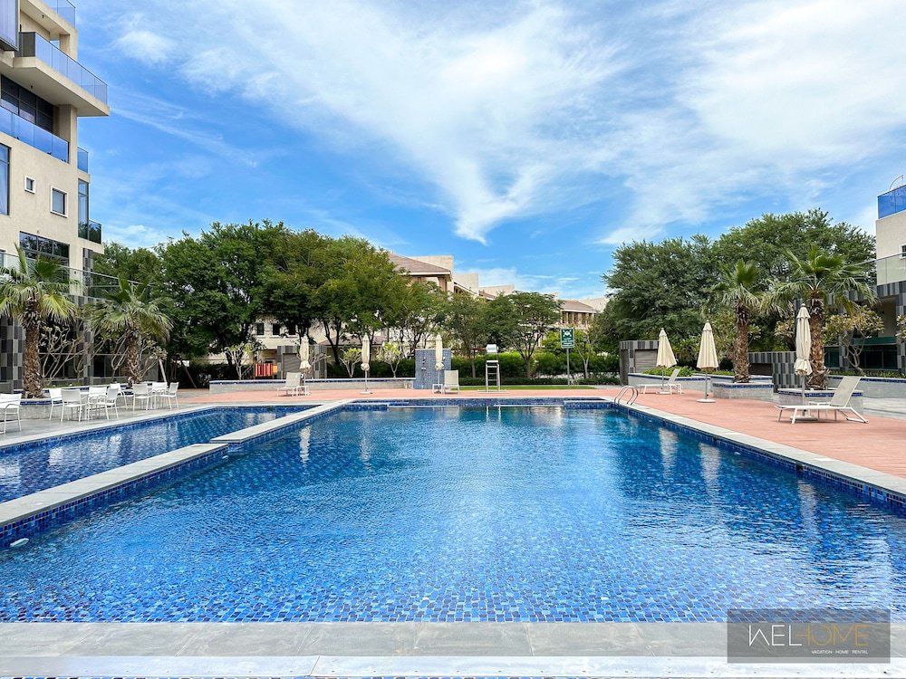 Дубай: WelHome - Prime 1BR Apartment at Oia Residence