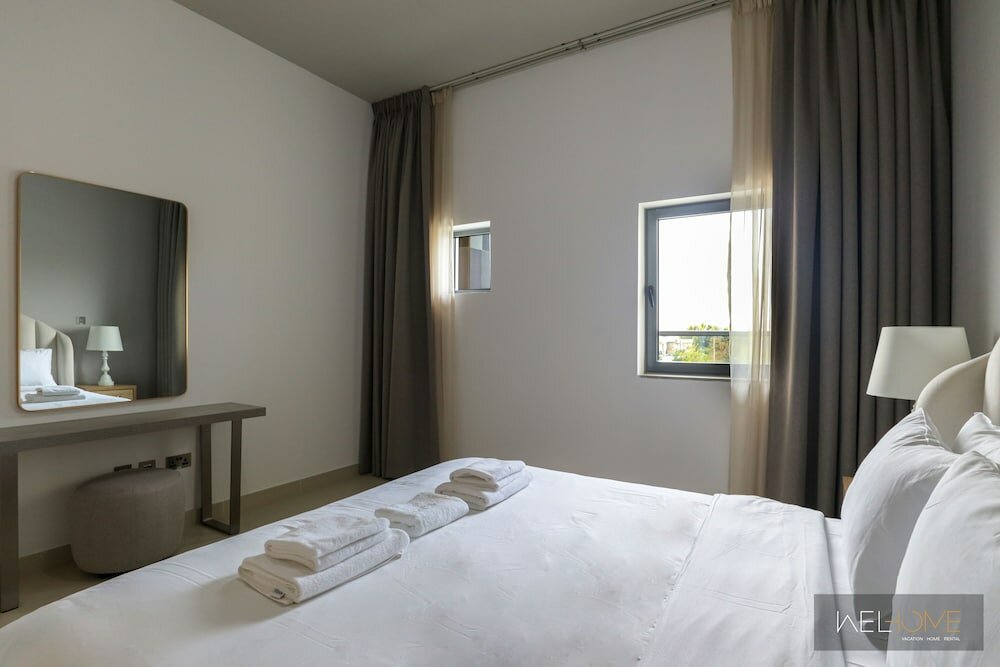 Дубай: WelHome - Prime 1BR Apartment at Oia Residence