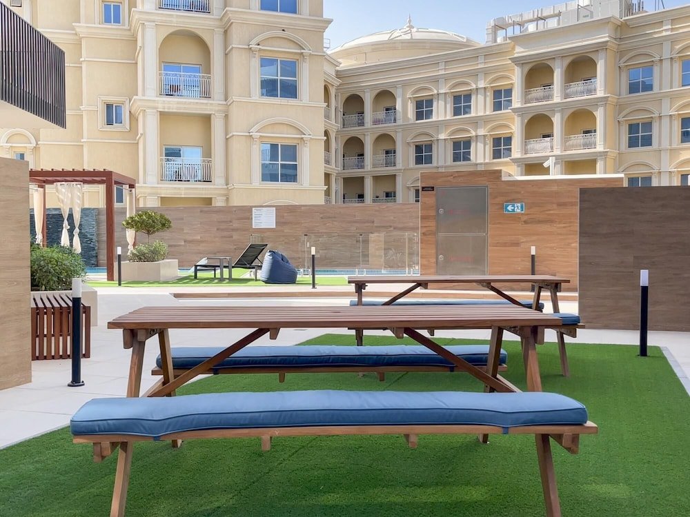 Дубай: Elite LUX Holiday Homes - Enchanting 1BR Apt Games Pool Gym Access in Arjan Dubai