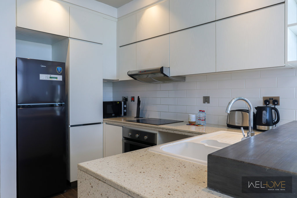 Дубай: Апартаменты WelHome - Prime 1BR Apartment at Oia Residence