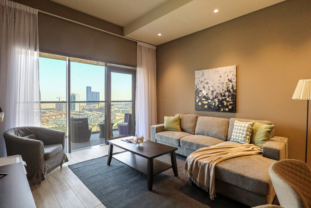 Дубай: Апартаменты WelHome - Evergreen Apartment Amidst Vibrant JVC With Pool