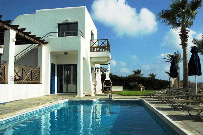 Киссонерга: Kymmates Beach Front Villas