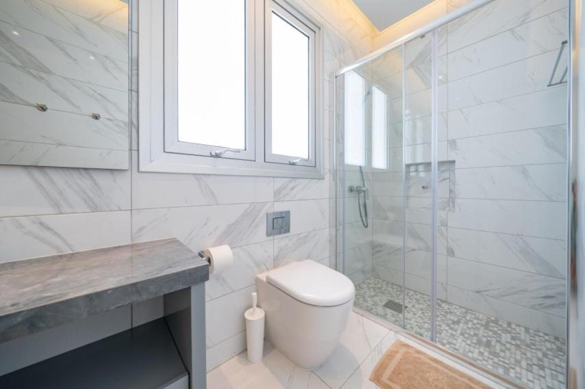Паралимни: Mythicals Ground floor with garden 2 bed apartment