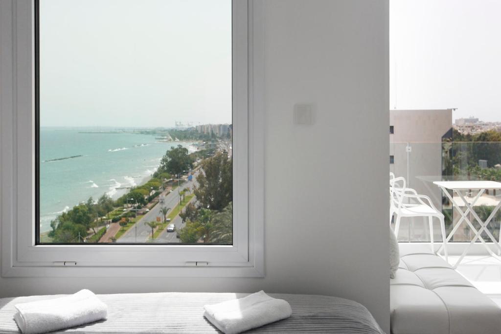 Лимассол: The White Pearl Suite - beach front city centre with sea view.