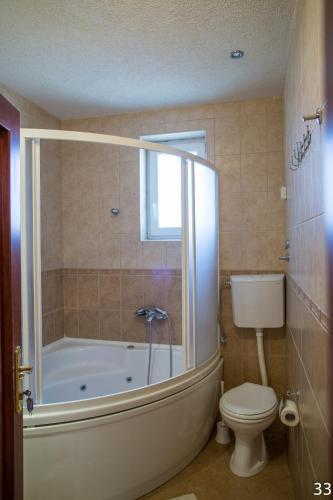 Доброта: Apartments and Rooms Troya