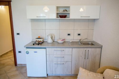 Доброта: Apartments and Rooms Troya