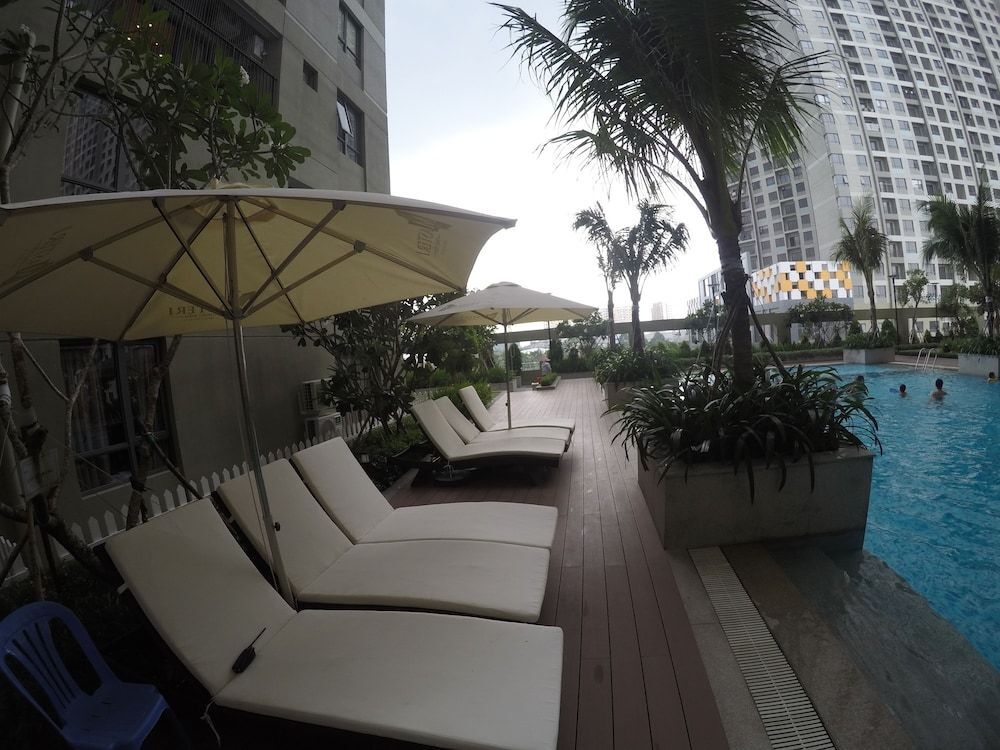 Хошимин: Riverfront Osis Resort Balcony