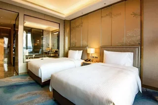 Яньтай: Pullman Yantai Center