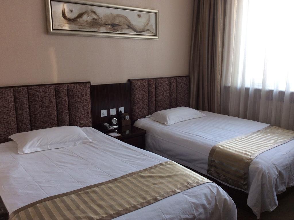 Харбин: Harbin Outai Business Hotel