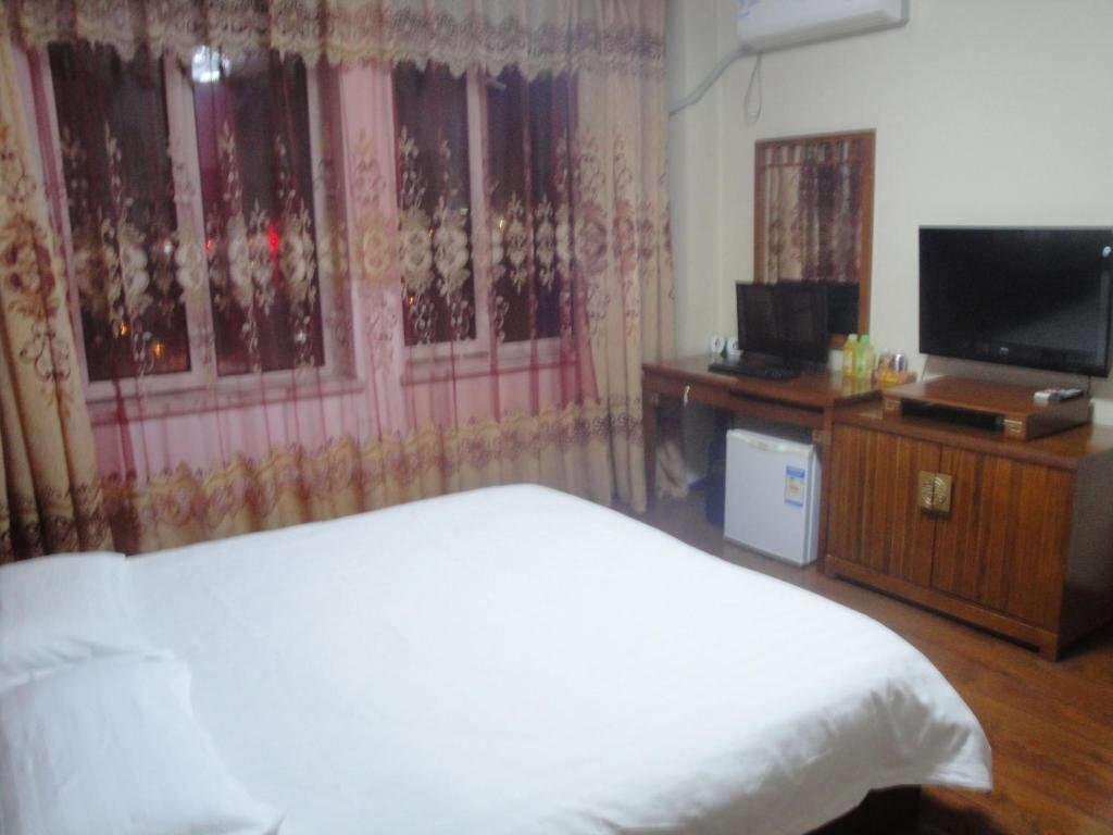 Муданьцзян: Mudanjiang Wan Zai Business Hotel