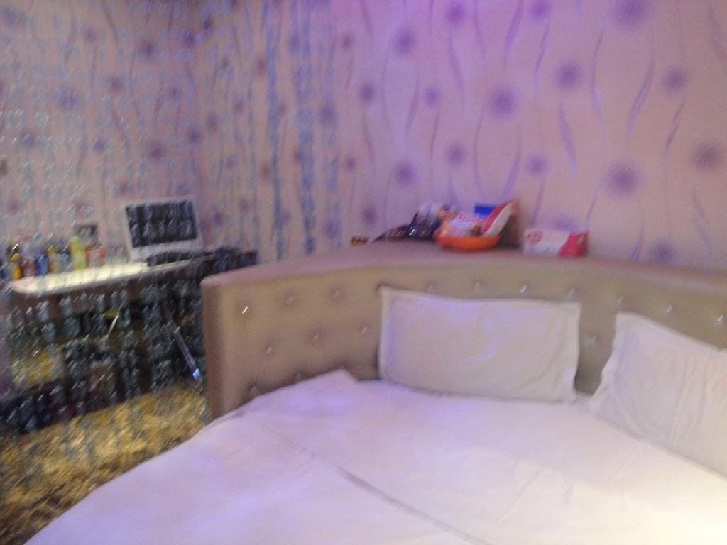 Муданьцзян: Mango Theme Hotel (Mudanjiang No. 4 Middle School)
