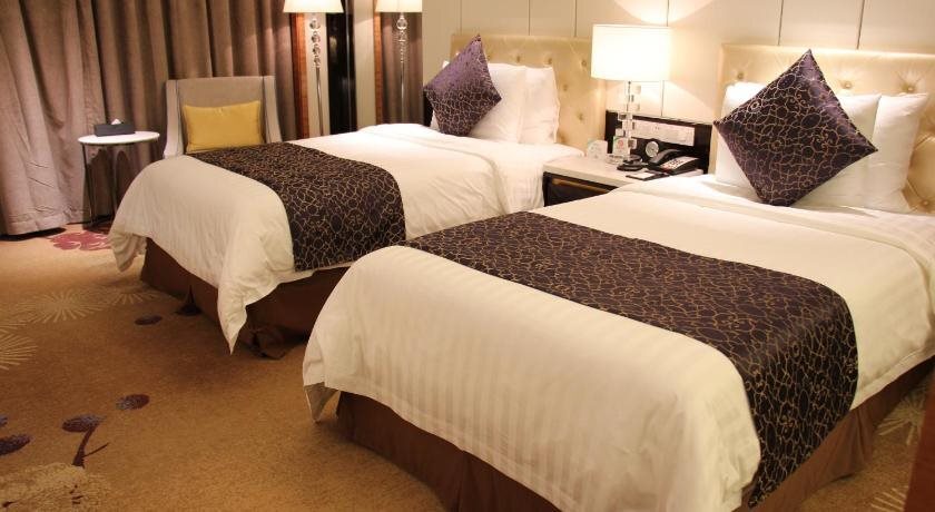 Суцянь: New Century Grand Hotel Siyang