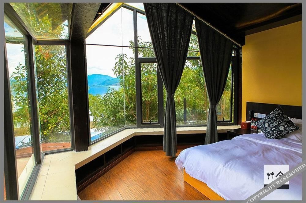 Лицзян: Lugu Lake Caoshe Vacation Inn